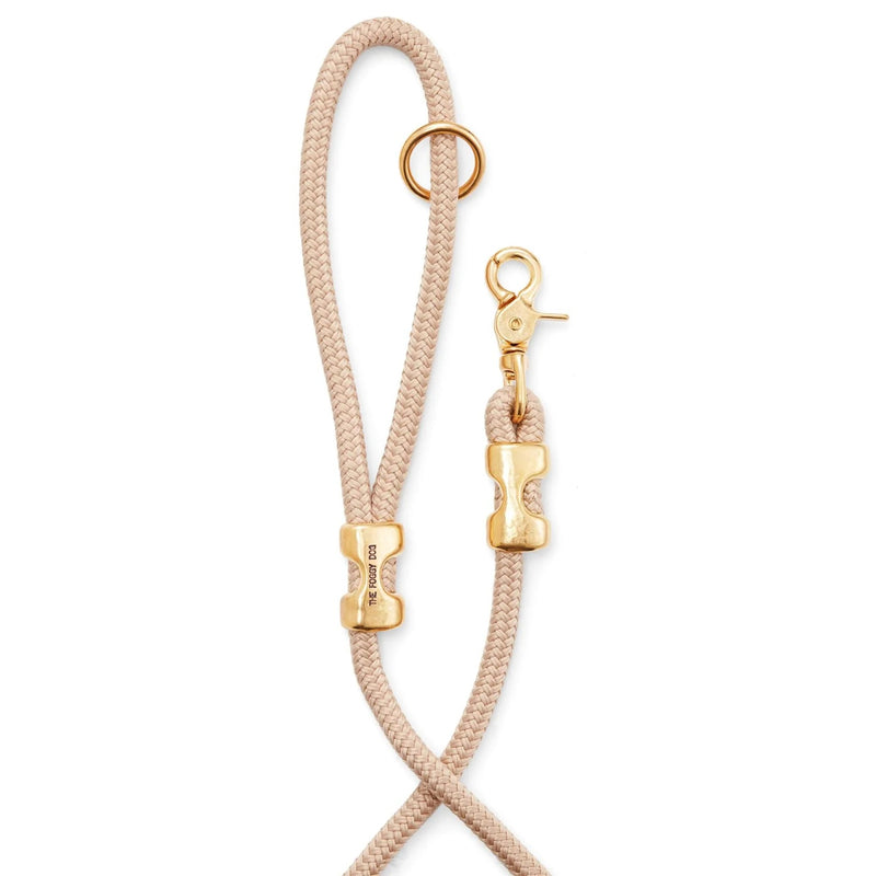 Beige rope with gold hardware on a white background