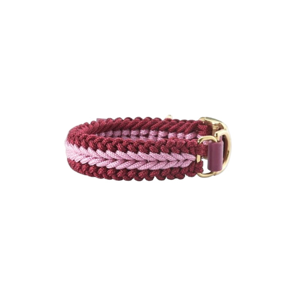 Bracelet with braided design in red and pink on a white background